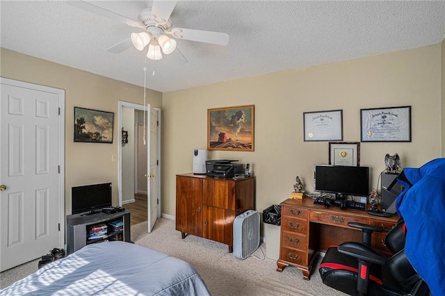 3264 Salem Cove Trl SE, Conyers, GA 30013 - bedroom with carpet, a desk, a ceiling fan, and a textured ceiling