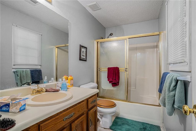 3264 Salem Cove Trl SE, Conyers, GA 30013 - full bathroom with vanity, a textured ceiling, and bath / shower combo with glass door