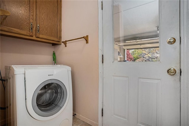 3264 Salem Cove Trl SE, Conyers, GA 30013 - washroom featuring cabinet space and washing machine and clothes dryer