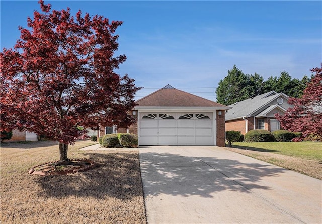 3264 Salem Cove Trl SE, Conyers, GA 30013 - view of front of house featuring a front lawn, driveway, brick siding, and roof with shingles
