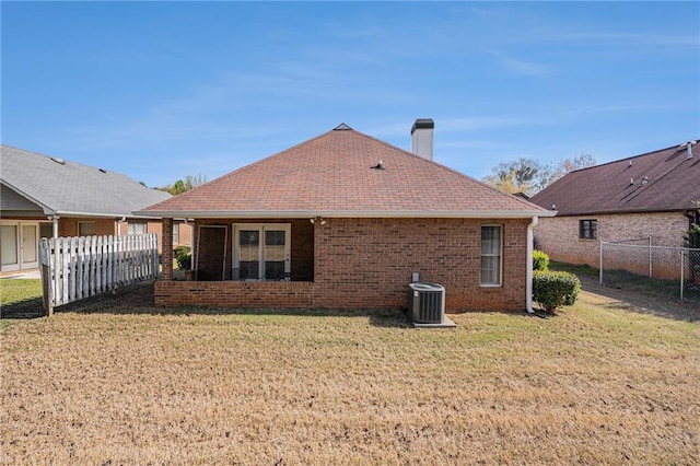 3264 Salem Cove Trl SE, Conyers, GA 30013 - back of property with a chimney and brick siding