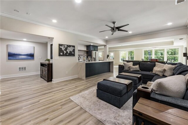 12380 Peyton Farm Way, Alpharetta, GA 30004 - living room featuring ornamental molding, ceiling fan, light wood-style floors, baseboards, and recessed lighting