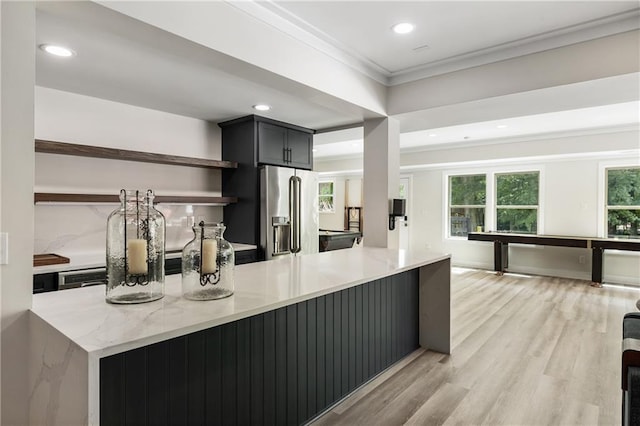 12380 Peyton Farm Way, Alpharetta, GA 30004 - kitchen with high quality fridge, crown molding, light stone counters, open shelves, and light wood finished floors