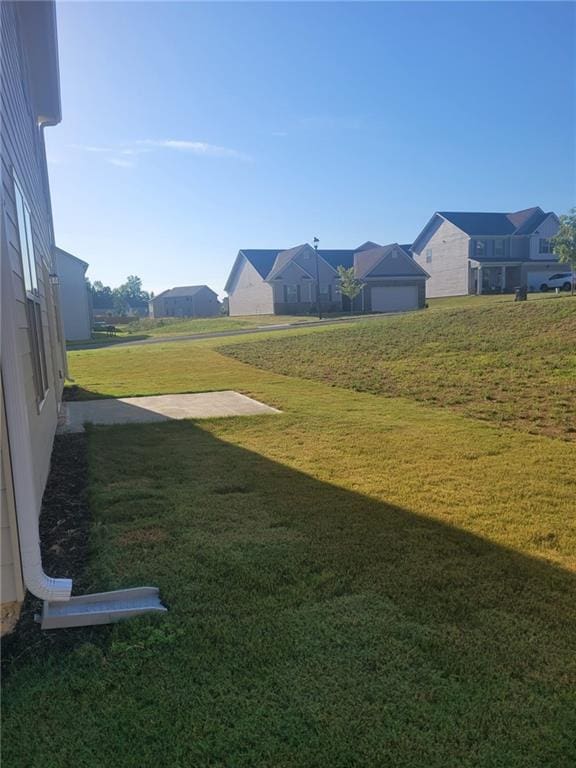 view of yard with a residential view