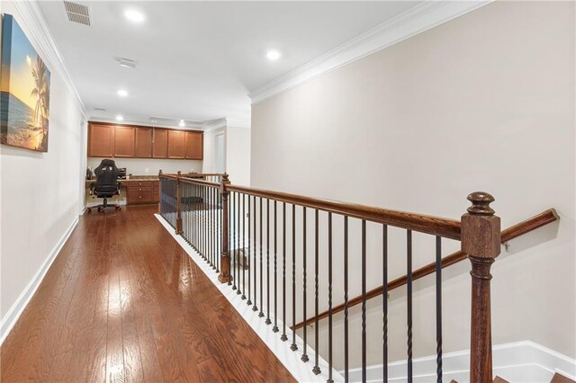 5910 Roxboro Ct, Cumming, GA 30040 - hall featuring dark wood-type flooring, crown molding, visible vents, and baseboards