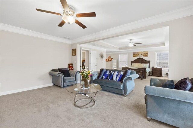 5910 Roxboro Ct, Cumming, GA 30040 - living room featuring a raised ceiling, ornamental molding, carpet, baseboards, and ceiling fan