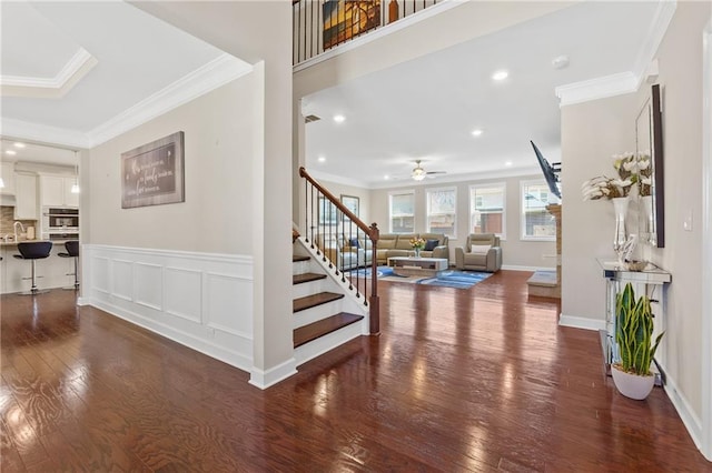 5910 Roxboro Ct, Cumming, GA 30040 - foyer entrance featuring a decorative wall, stairway, crown molding, and wood-type flooring