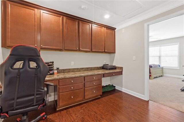 5910 Roxboro Ct, Cumming, GA 30040 - office space featuring dark wood-style floors, built in study area, crown molding, and baseboards