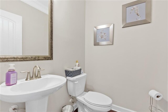 5910 Roxboro Ct, Cumming, GA 30040 - half bath with a sink, baseboards, and toilet