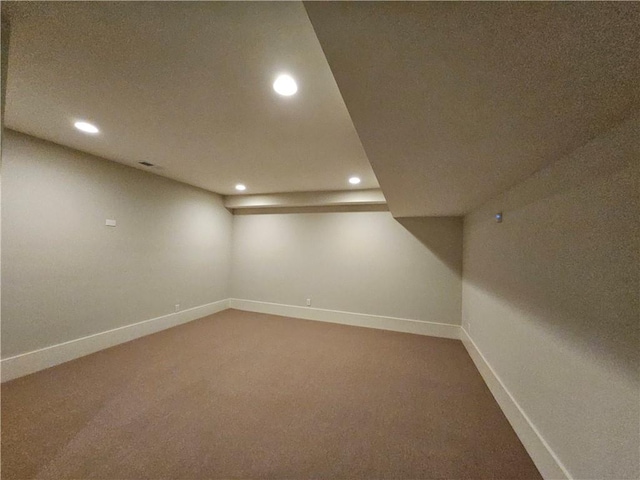 basement featuring carpet