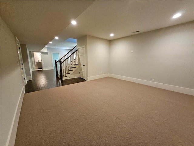 basement with dark carpet