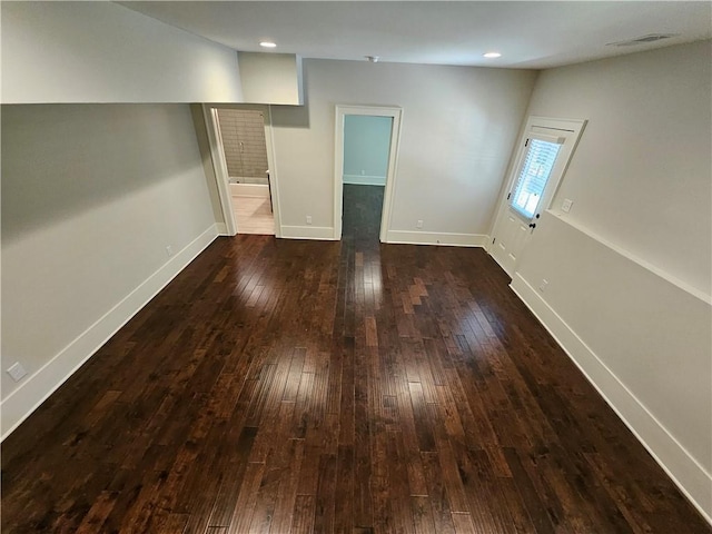 interior space with dark hardwood / wood-style flooring