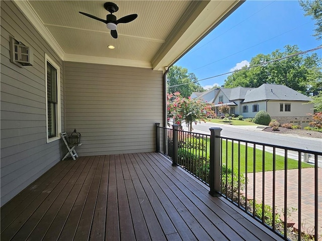 wooden deck with ceiling fan and covered porch