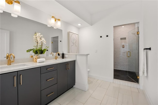 bathroom featuring vanity, an enclosed shower, and toilet