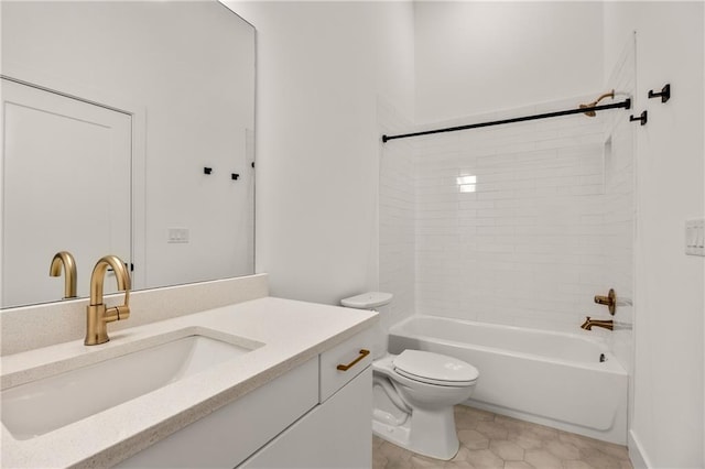 full bathroom featuring tiled shower / bath combo, vanity, tile patterned floors, and toilet