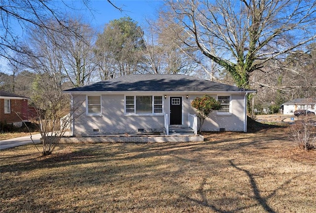 ranch-style house featuring a front yard