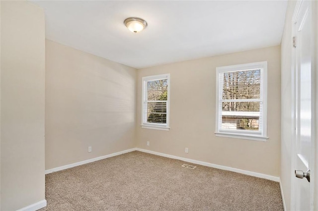 view of carpeted spare room