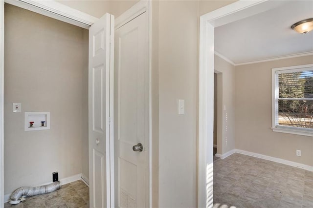 clothes washing area featuring washer hookup and crown molding