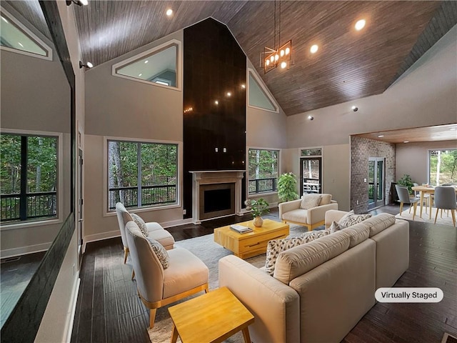 living room with wood ceiling, dark hardwood / wood-style flooring, and high vaulted ceiling