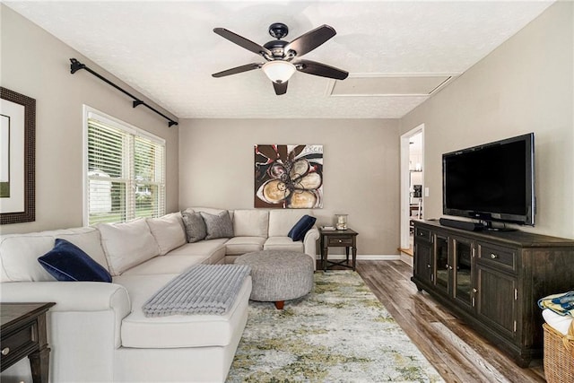 5396 Amhurst Dr, Peachtree Corners, GA 30092 - living room featuring a ceiling fan, wood finished floors, attic access, and a textured ceiling