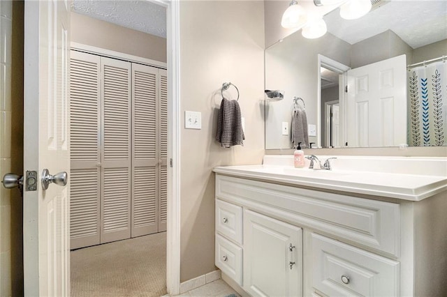 5396 Amhurst Dr, Peachtree Corners, GA 30092 - bathroom featuring vanity and a closet
