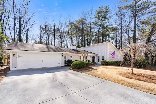 ranch-style home with a garage