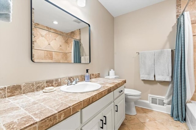 full bathroom with vanity, toilet, tile patterned flooring, and shower / bath combo with shower curtain