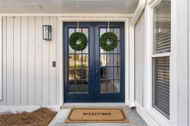 entrance to property featuring french doors