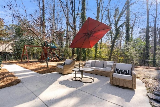 view of patio / terrace with a playground and an outdoor living space