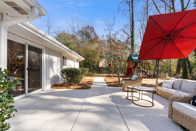 view of patio / terrace featuring outdoor lounge area and a playground