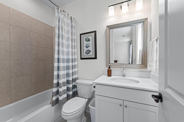 full bath with shower / bath combo with shower curtain, toilet, and vanity