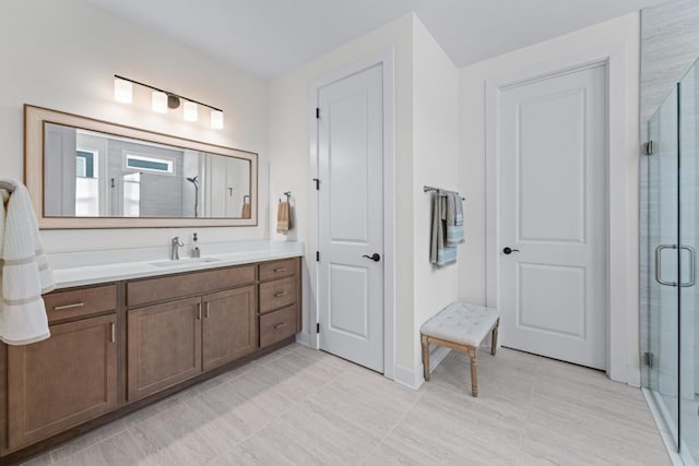 full bath featuring a shower stall and vanity