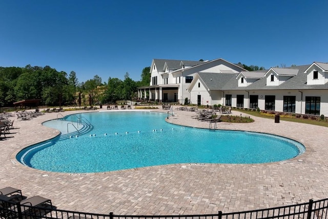 pool with a patio area