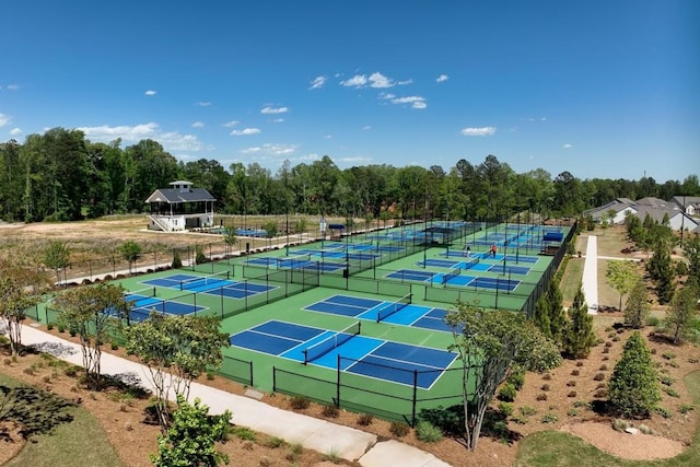 view of tennis court with fence