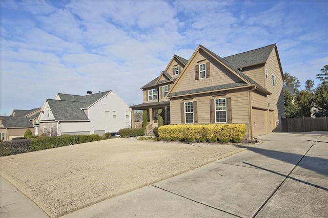 view of front of house with a garage and covered porch