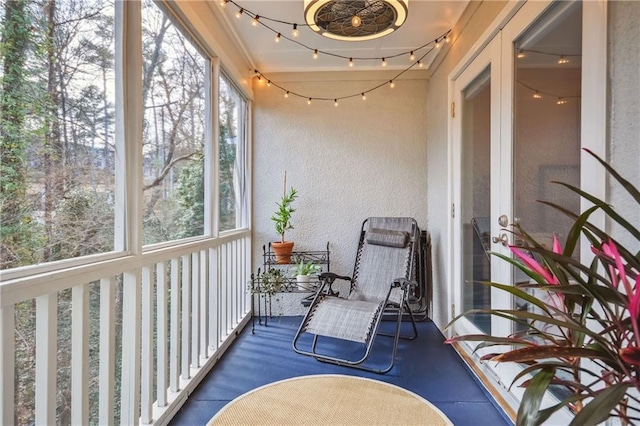 sunroom / solarium with track lighting