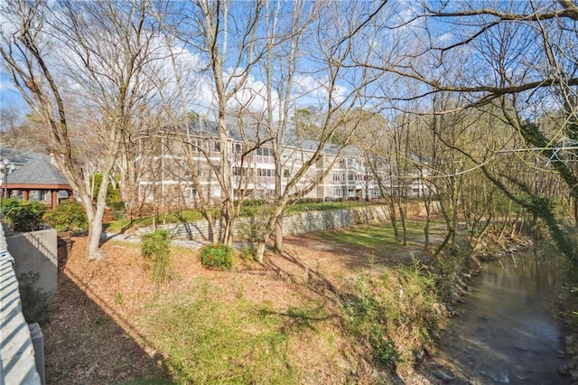 view of yard featuring a water view