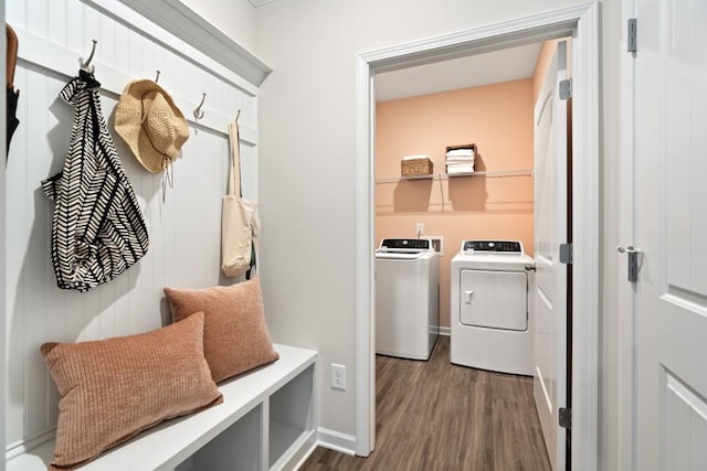 mudroom featuring dark hardwood / wood-style flooring and washer and dryer