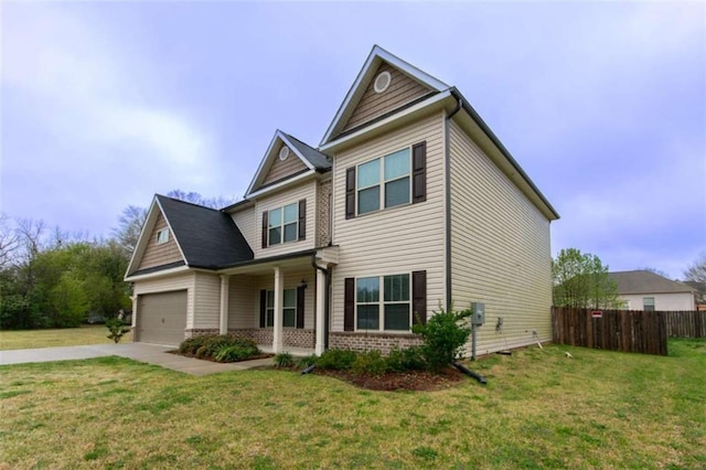 craftsman inspired home featuring a front yard, fence, an attached garage, concrete driveway, and brick siding