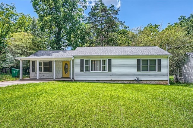 single story home with covered porch and a front yard