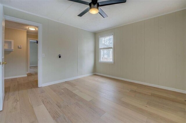 4131 Carroll St, Covington, GA 30014 - empty room with light wood-style floors and ceiling fan