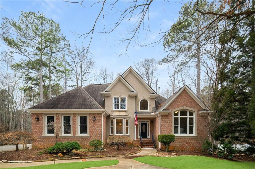 view of property with a front lawn