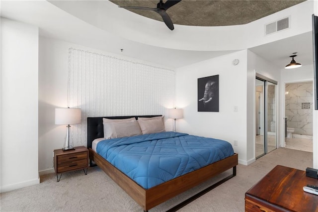 3324 Peachtree Rd NE Unit 1813, Atlanta, GA 30305 - bedroom featuring carpet floors, baseboards, ensuite bathroom, and a ceiling fan