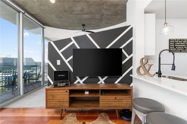 3324 Peachtree Rd NE Unit 1813, Atlanta, GA 30305 - living room featuring wood finished floors and a wall of windows