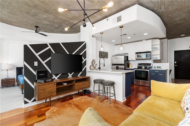 3324 Peachtree Rd NE Unit 1813, Atlanta, GA 30305 - living room with wood finished floors, ceiling fan, and recessed lighting