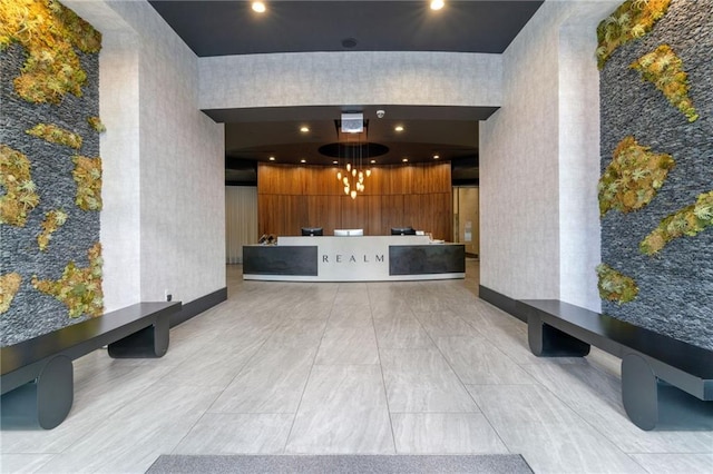 3324 Peachtree Rd NE Unit 1813, Atlanta, GA 30305 - reception featuring recessed lighting, a towering ceiling, and a chandelier