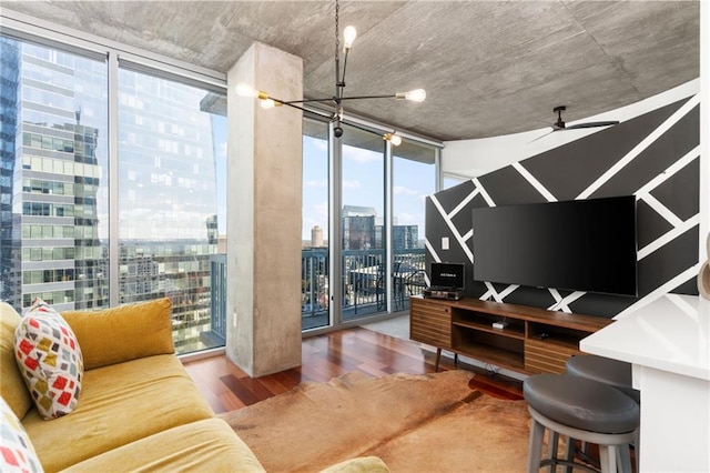 3324 Peachtree Rd NE Unit 1813, Atlanta, GA 30305 - living room with a wall of windows, wood finished floors, ceiling fan, and a chandelier