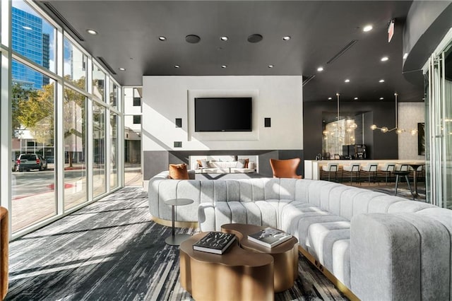 3324 Peachtree Rd NE Unit 1813, Atlanta, GA 30305 - living area featuring a wall of windows, a chandelier, and recessed lighting