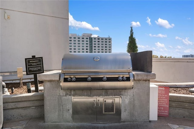 3324 Peachtree Rd NE Unit 1813, Atlanta, GA 30305 - view of patio featuring area for grilling