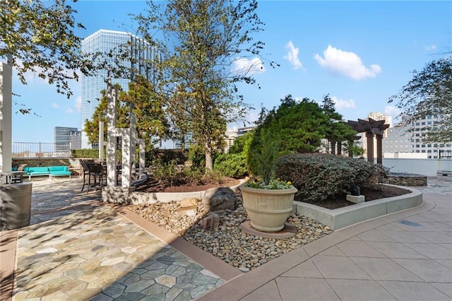 3324 Peachtree Rd NE Unit 1813, Atlanta, GA 30305 - surrounding community featuring a patio and an outdoor hangout area